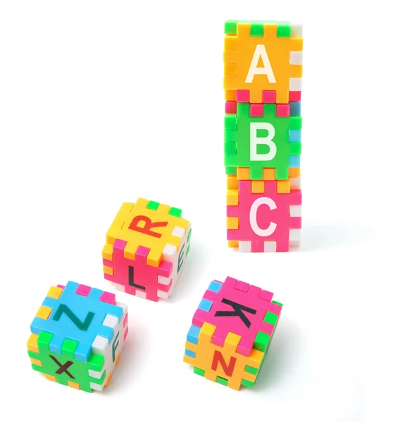 Cubos de quebra-cabeça alfabeto — Fotografia de Stock