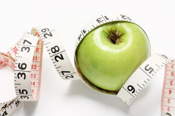 Granny Smith Apple and Tape Measure — Stock Photo, Image