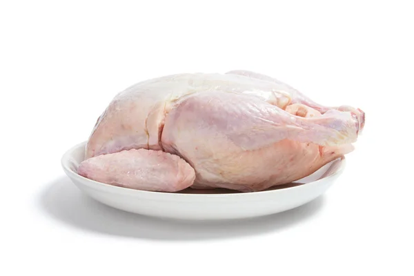 Pollo crudo sul piatto — Foto Stock