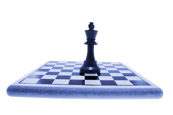 Król szachowy kawałek na szachownicy — Zdjęcie stockowe