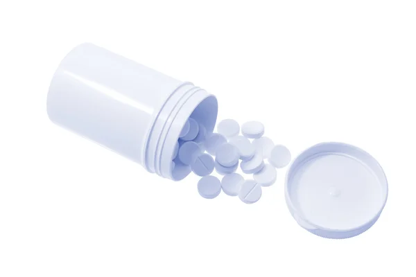 Pillen in plastic pot — Stockfoto