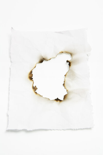 Paper with Burnt Hole