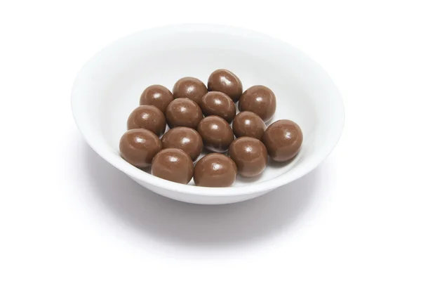 Chocolates em uma tigela — Fotografia de Stock