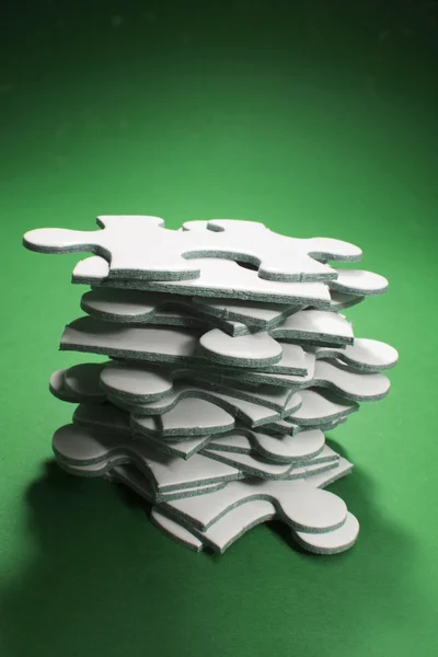 ジグソー パズルのピースのスタック — ストック写真