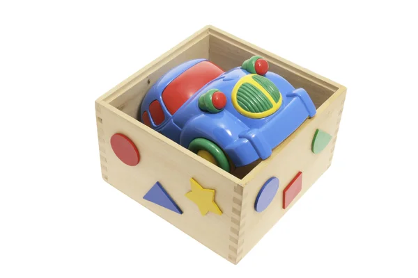 Coche de juguete en caja de madera — Foto de Stock