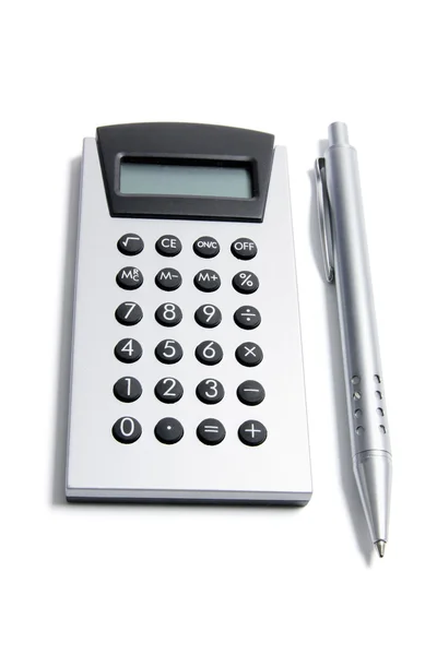 Калькулятор и ручка Лицензионные Стоковые Фото