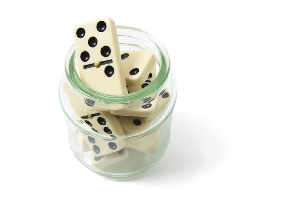 Domino's in glazen pot — Stockfoto