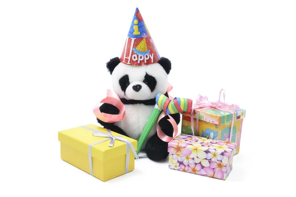 Panda jouet avec des faveurs de fête et des boîtes-cadeaux — Photo