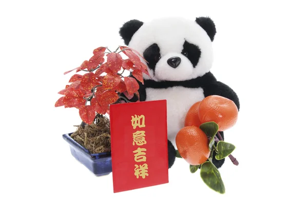 Speelgoed panda met Chinees Nieuwjaar decoraties — Stockfoto