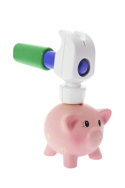 Banco Piggy miniatura e martelo de brinquedo — Fotografia de Stock
