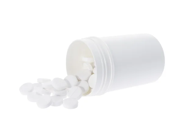 Tabletki w butelce z tworzywa sztucznego — Zdjęcie stockowe