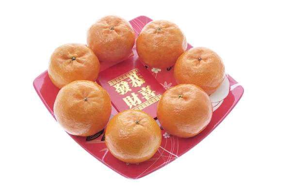Mandarini e pacchetti rossi — Foto Stock