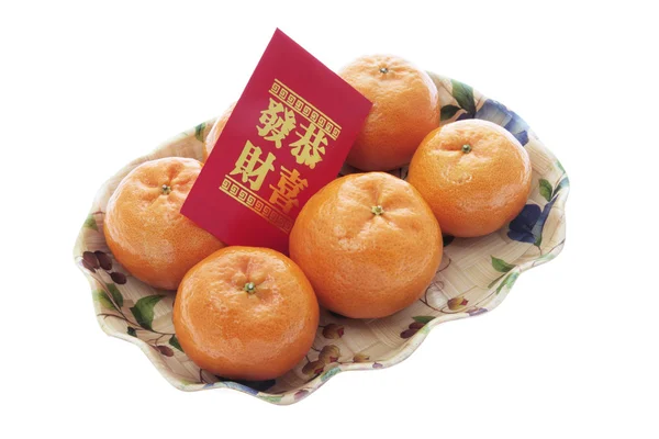 Mandarins and Red Packet — Stock Photo, Image