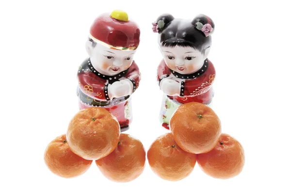 Figure cinesi e mandarini — Foto Stock
