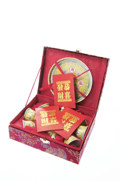 Čínský čajový set a červená pakety — Stock fotografie