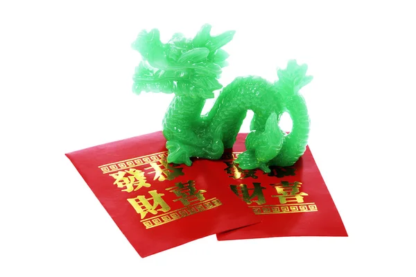 Jage draak ornament en rood pakketten — Stockfoto