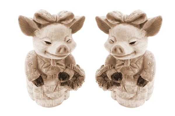 Ornamenti di maiale con cestini — Foto Stock