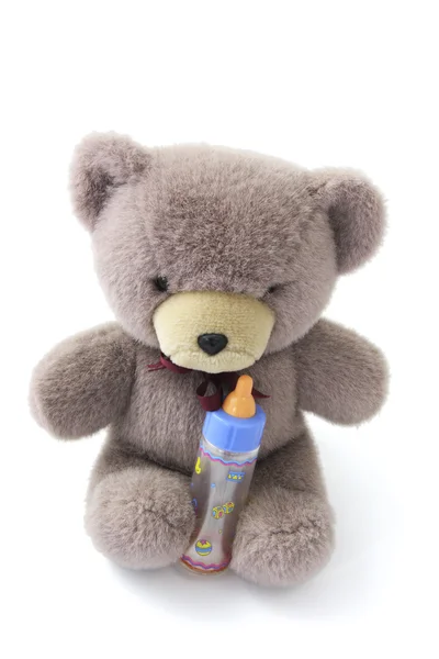 Teddy Bear with Milk Bottle — Stock Photo, Image