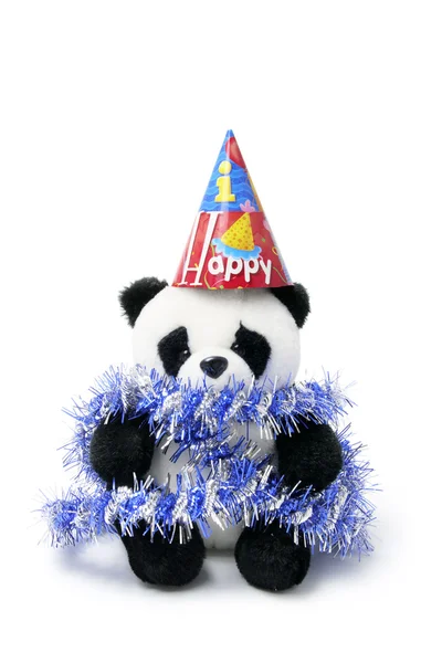 Plyšová hračka panda s karnevalovou čepičku a kejklířů — Stock fotografie