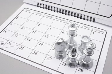 Chess Pieces on Calendar clipart