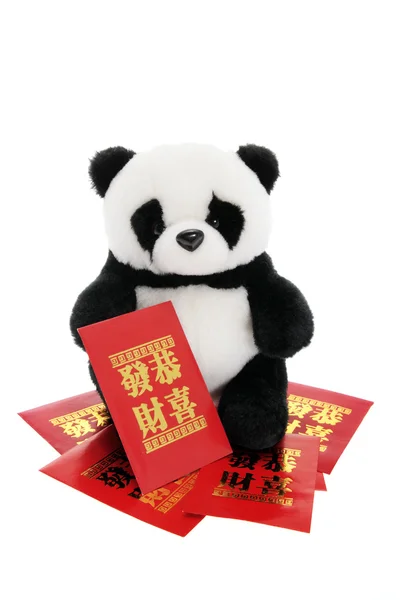 Zacht stuk speelgoed panda met gelukkige geld enveloppen — Stockfoto