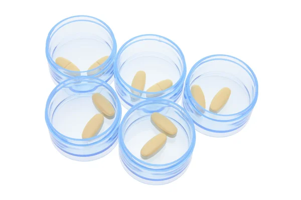 Comprimidos em caixas de pílulas — Fotografia de Stock