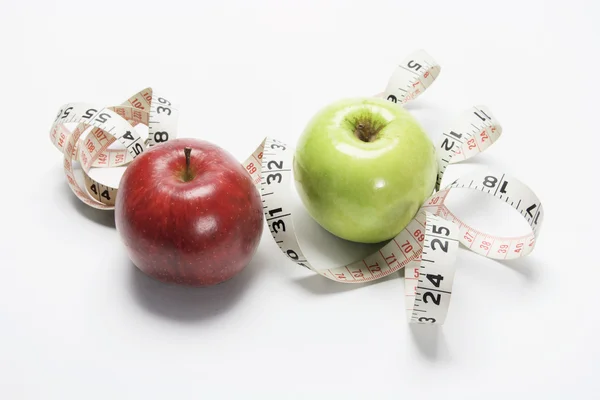 Pommes et ruban à mesurer — Photo