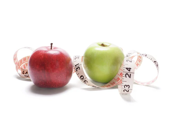 Яблоки и лента — стоковое фото