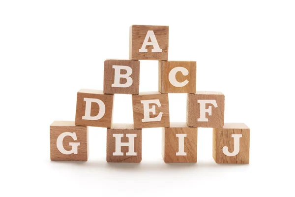 Стек алфавитных деревянных блоков — стоковое фото