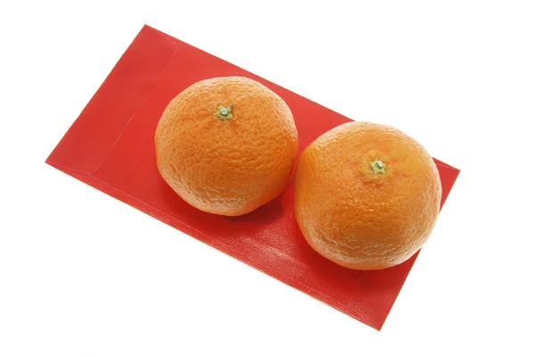 Mandarinas y paquete rojo — Foto de Stock