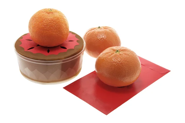 Chinese New Year Cake and Mandarins — Stock Photo, Image