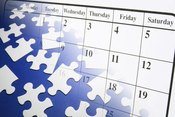 Legpuzzels en kalender — Stockfoto
