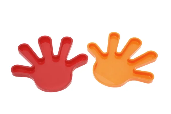 Mãos de brinquedo de plástico Fotos De Bancos De Imagens