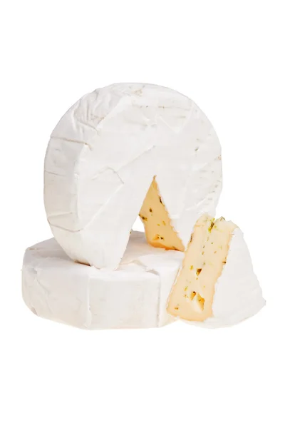 Blocos de queijo redondos empilhados . Imagem De Stock
