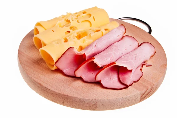 在木桌上的火腿和奶酪卷. — 图库照片