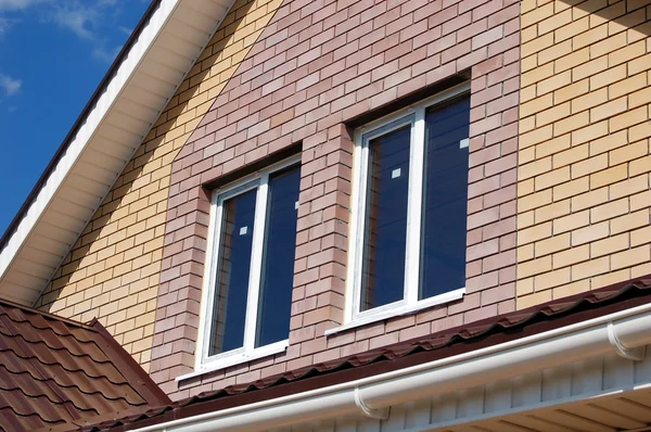 stock image Two windows on a house facade