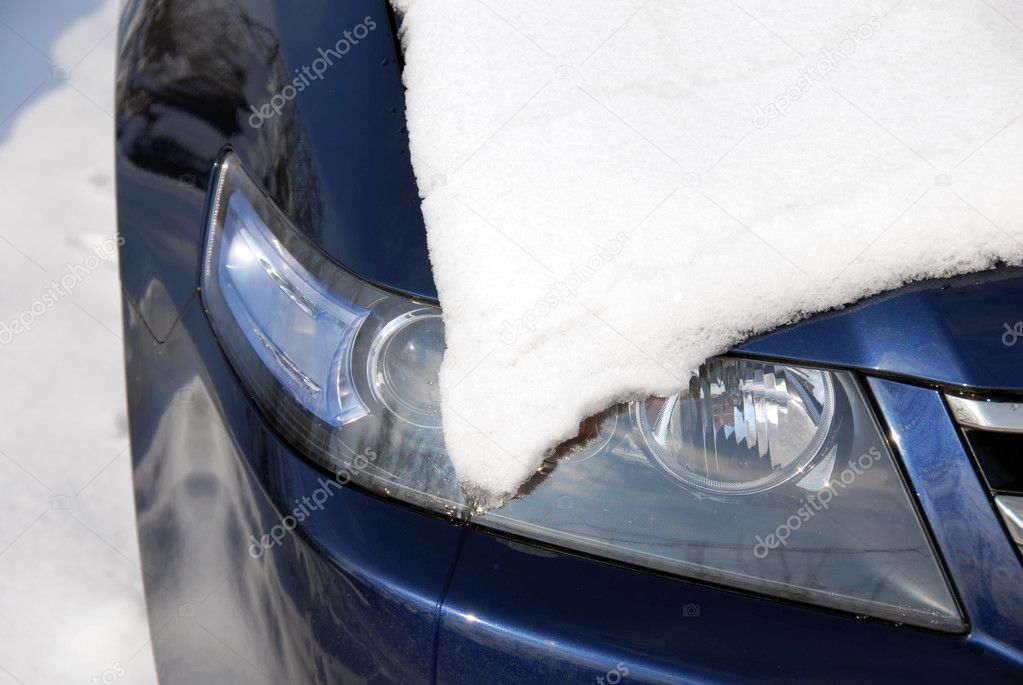 Snow covering a headlight