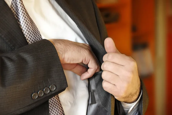 Üzletember kéz a belső zseb — Stock Fotó