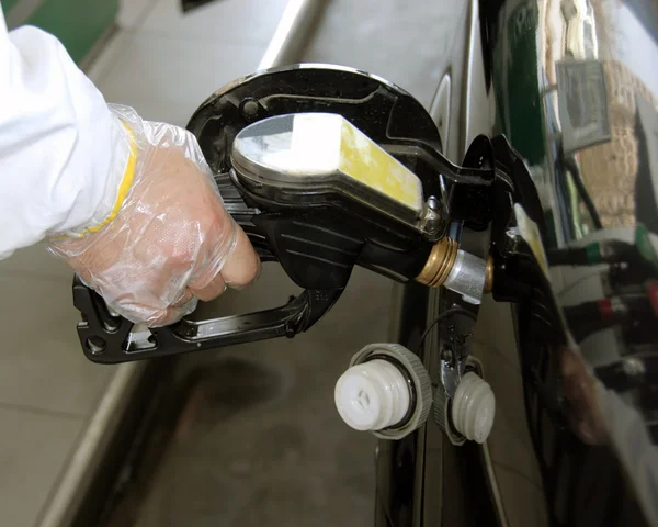 Pouring petrol — Stock Photo, Image