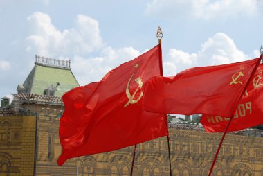 Red soviet flags on Red Square in Moscow clipart