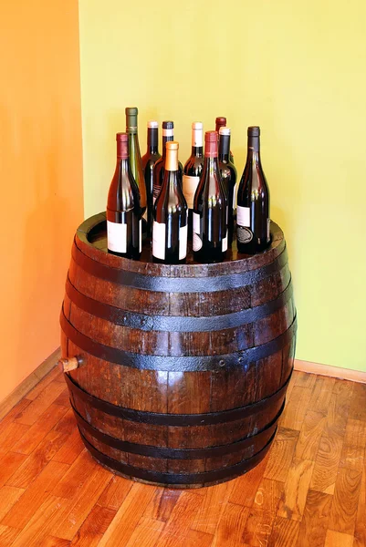 Wine over wood barrel — Stock Photo, Image