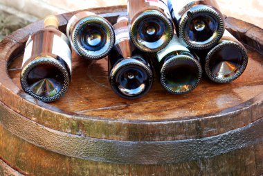Wine over wood barrel clipart