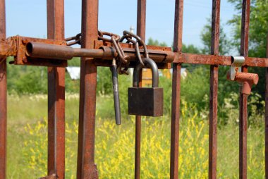 Locked rusty gate clipart