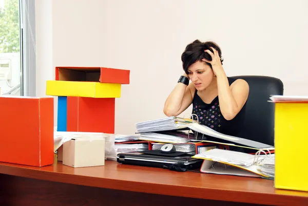 Despaired woman overloaded with work — Stock Photo, Image