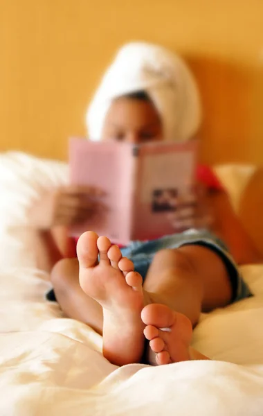 stock image Teenage girl reading a book