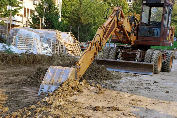 Bulldozer en el sitio de construcción — Foto de Stock