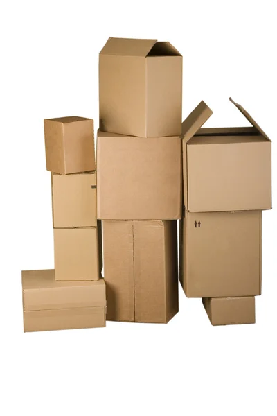 Yığın halinde düzenlenmiş farklı kahverengi karton kutu — Stok fotoğraf
