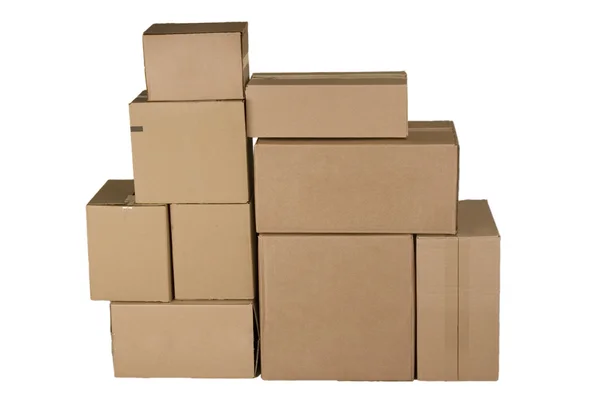 Different cardboard boxes arranged in stack — Stock Photo, Image