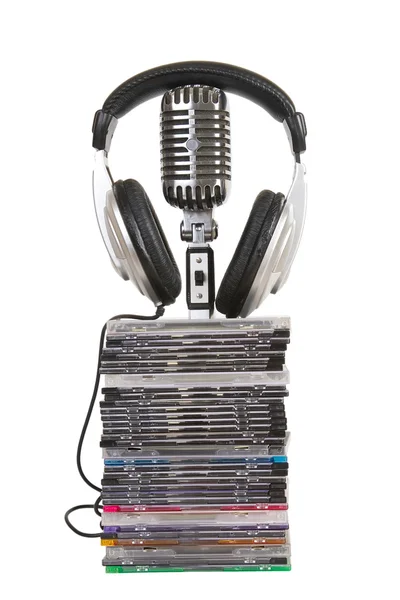 Headphones , vintage microphone, dvd — Stock Photo, Image