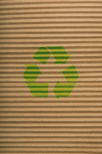 Signo de textura y reciclaje de cartón marrón — Foto de Stock